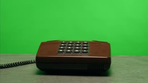 Retro Vintage Phone on Chroma Key Green Screen Rotary Telephone is Displayed on a Wooden Desk Adding