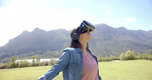 Woman Experiencing Virtual Reality in Nature