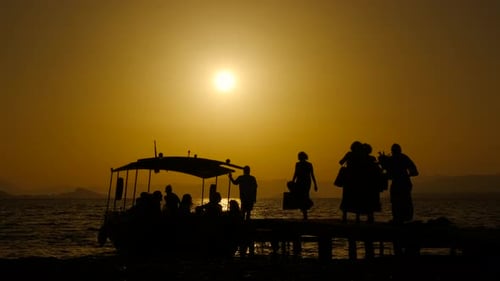 Golden Sunset Silhouette by Ocean Dock