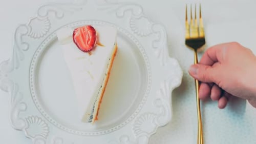 Delicious Strawberry Cake on a Decorative Plate