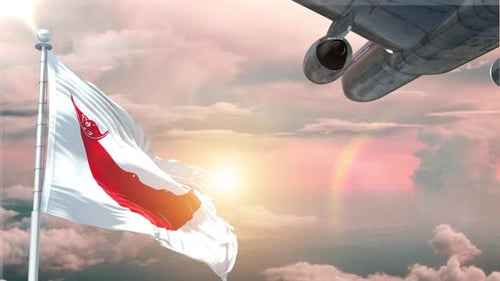 Flag Waving with Airplane Flying in Sunny Cloudy Sky