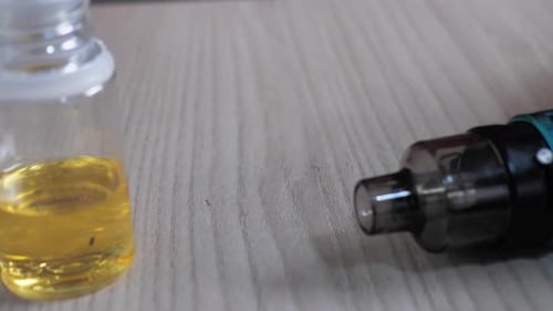 Filling the Tank of an Electronic Cigarette with Liquid