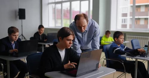 Future Programmer Studying In School Programming Courses For School Students Teen and Teacher