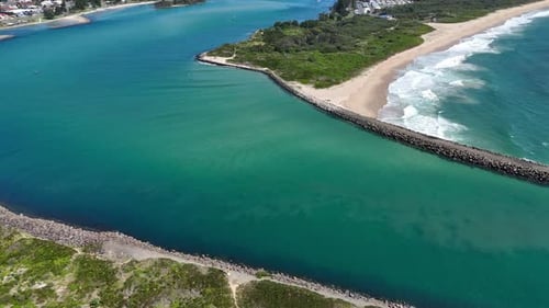 Drone Over Narrow Inlet with Sandy Edges