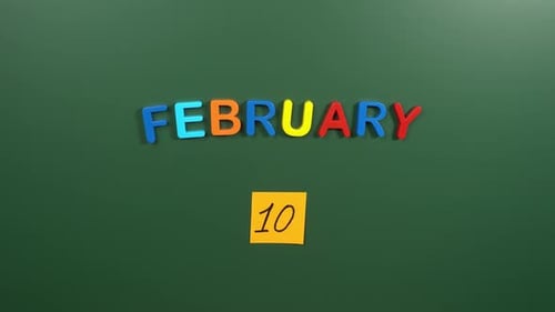 Hand sticking a sticker 10 February calendar day on school board. 10 date of February. Tenth day