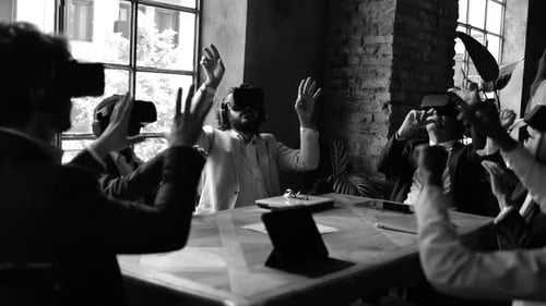 Multiracial business people wearing virtual reality futuristic goggles inside office
