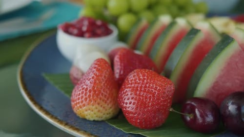 Plate in Restaurant Showcasing Fresh Fruits and Berries on Table in Closeup Delicious Berries Fresh