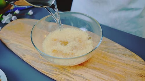 Pouring Rice with Clean Water