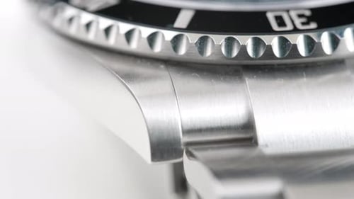 Close up of a rotating watch silver color. Vintage Watch Face