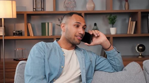 Close Up of Cheerful Businessman Having Phone Call Business Conversation