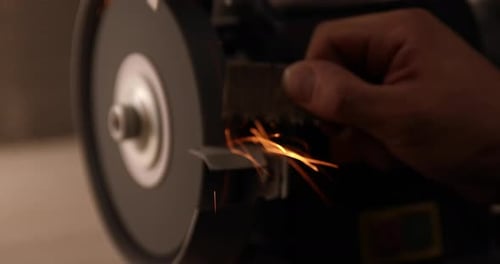 Closeup of Abrasive Disc on Bench Grinder Machine