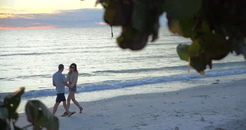 Beautiful Woman Dances on Beach with Boyfriend, Ocean,