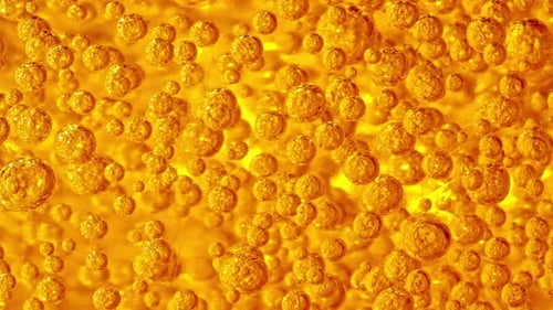 Zeitlupe sich bewegender gelbgoldener Ölluftblasen