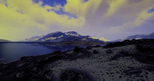 Majestic Mountain Landscape with Shimmering Lake and Vibrant Clouds at Dusk