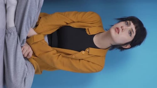 Woman Experiencing Headache and Stomach Ache