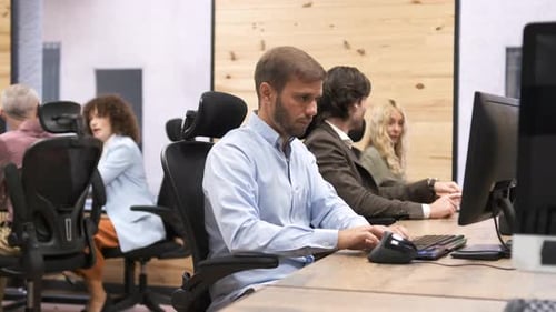 People Working in a Modern Open Office