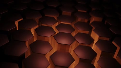 Close up of pattern of hexagonal tiles with orange light. Looped animation