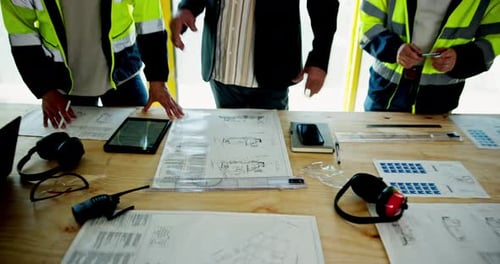 Blueprint, collaboration and planning with construction worker team in office for discussion