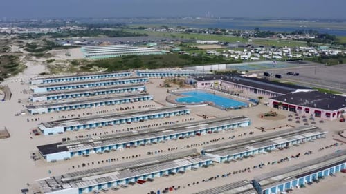 Aerial of cabanas lining the shore of Long Beach in Long Island