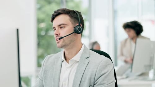Call center, customer service and man in office talking for help, advice and consulting on computer