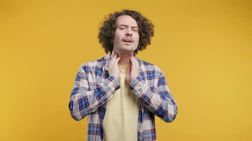 Ill Handsome Man Has Sore Guy With Swollen Throat On Yellow Studio Angina Pain