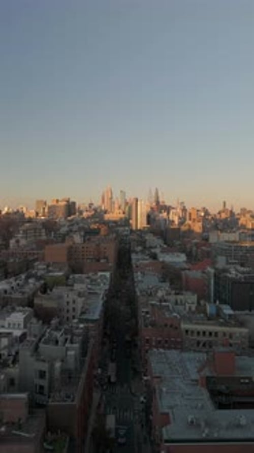 Vertical Aerial Views Showcase Midtown Manhattan New York City Street As Sunset Bathes Skyscrapers