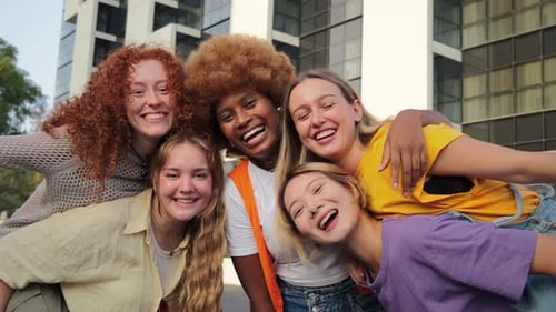Diverse Women Friends Smiling Together in City