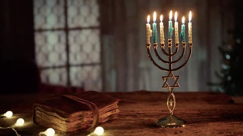 Menorah with Lit Candles on Wooden Table