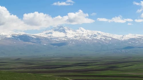 Landscapes and Mountains of Armenia Clouds Move Over the Snowy Peaks of the Mountains in Armenia