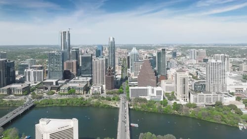 Downtown Austin Aerial Drone Flying Above Congress Avenue Bridge Texas USA