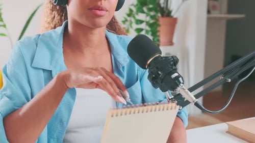Woman Recording Podcast in Home Studio