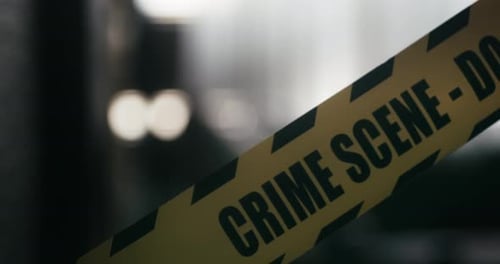 Crime Scene Tape Close Up at Night