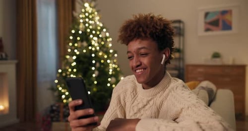 Young Adult Video Call at Christmas Time