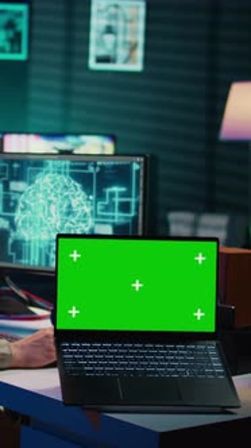 Vertical Video Engineer with EEG Headset on Merging with AI Green Screen Laptop