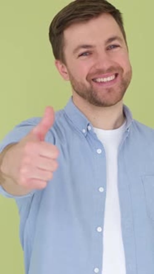 Man Giving Thumbs Up with a Happy Smile