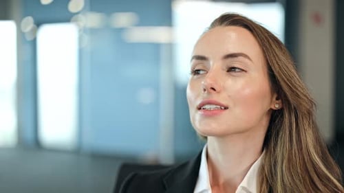Professional Businesswoman Contemplates in Corporate Office