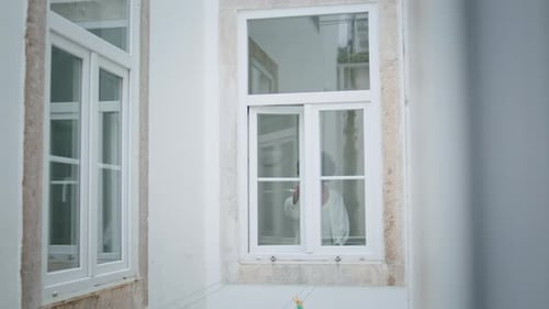 Peaceful Woman Opening Window at Morning House. African American Girl Looking Outdoors