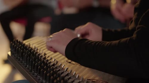 Hands Playing the Traditional Turkish Kanun