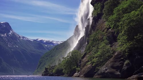 Stunning view of the beautiful Seven Sisters waterfall in the Geiranger fjord, Norway. Powerful stre
