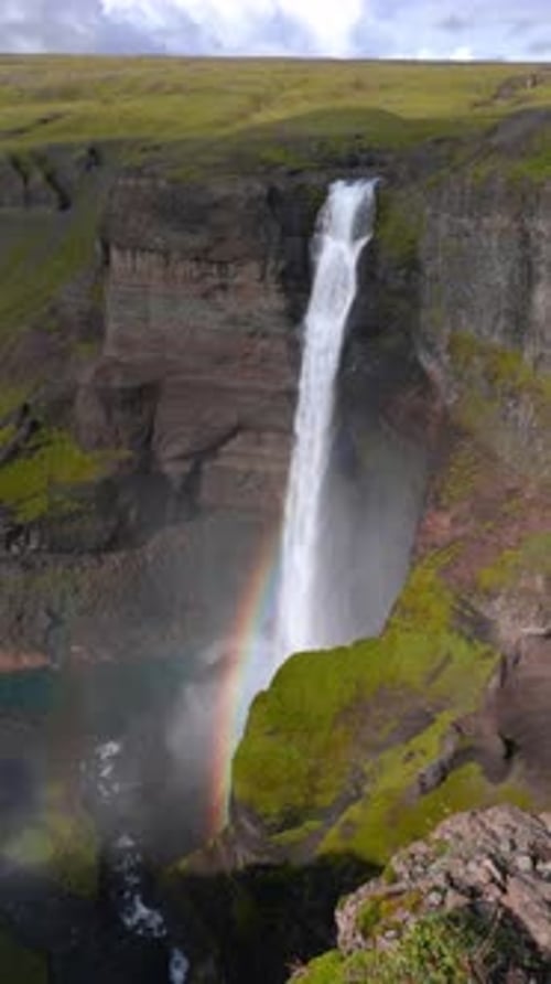 Aerial Top Down View of Haifoss Waterfall and Rainbow in Iceland