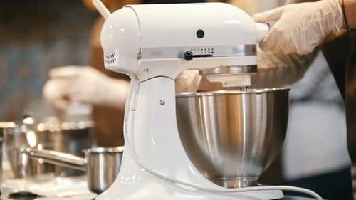 Process of Cooking Meringue Whipped Egg Whites on Mixer Whisk