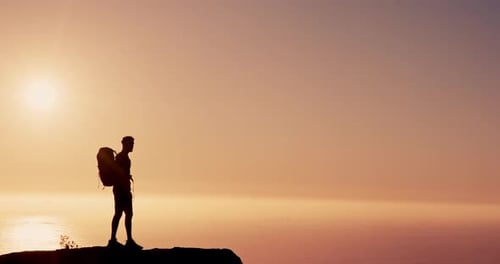 Person, silhouette and hiking on mountain with sunset sky, ocean and mock up space on vacation