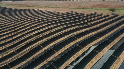 Aerial View of Vast Solar Panel Field