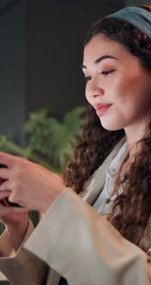 Happy, woman and typing with phone in office for stock market, financial increase and investment