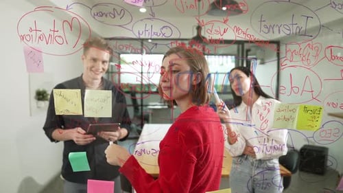 Team Brainstorming Ideas Together in Modern Office