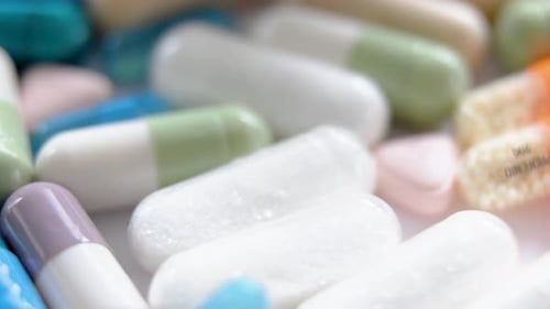 Close Up of Various Colorful Pills and Capsules