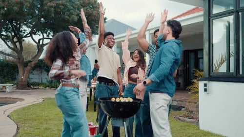 Group of Friends Celebrate at Backyard Barbecue