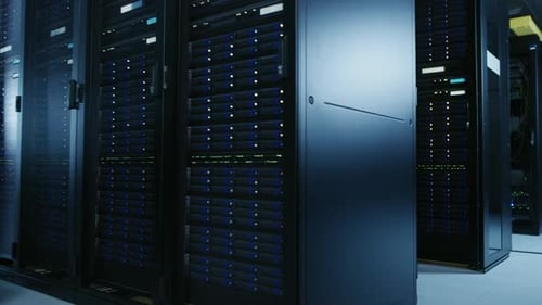 In the Modern Data Center: Engineer and IT Specialist Work with Server Racks, on a Pushcart Equipme