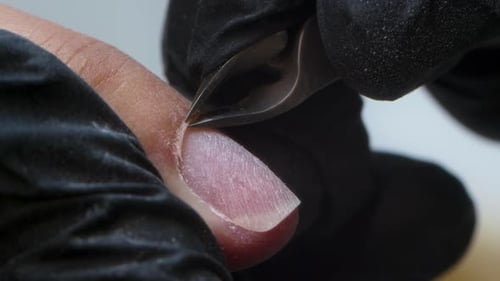 Close-up Fingernail Cuticle Trimming with Cuticle Nippers