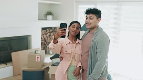 Video call, couple and happy together in new home or moving in with real estate property